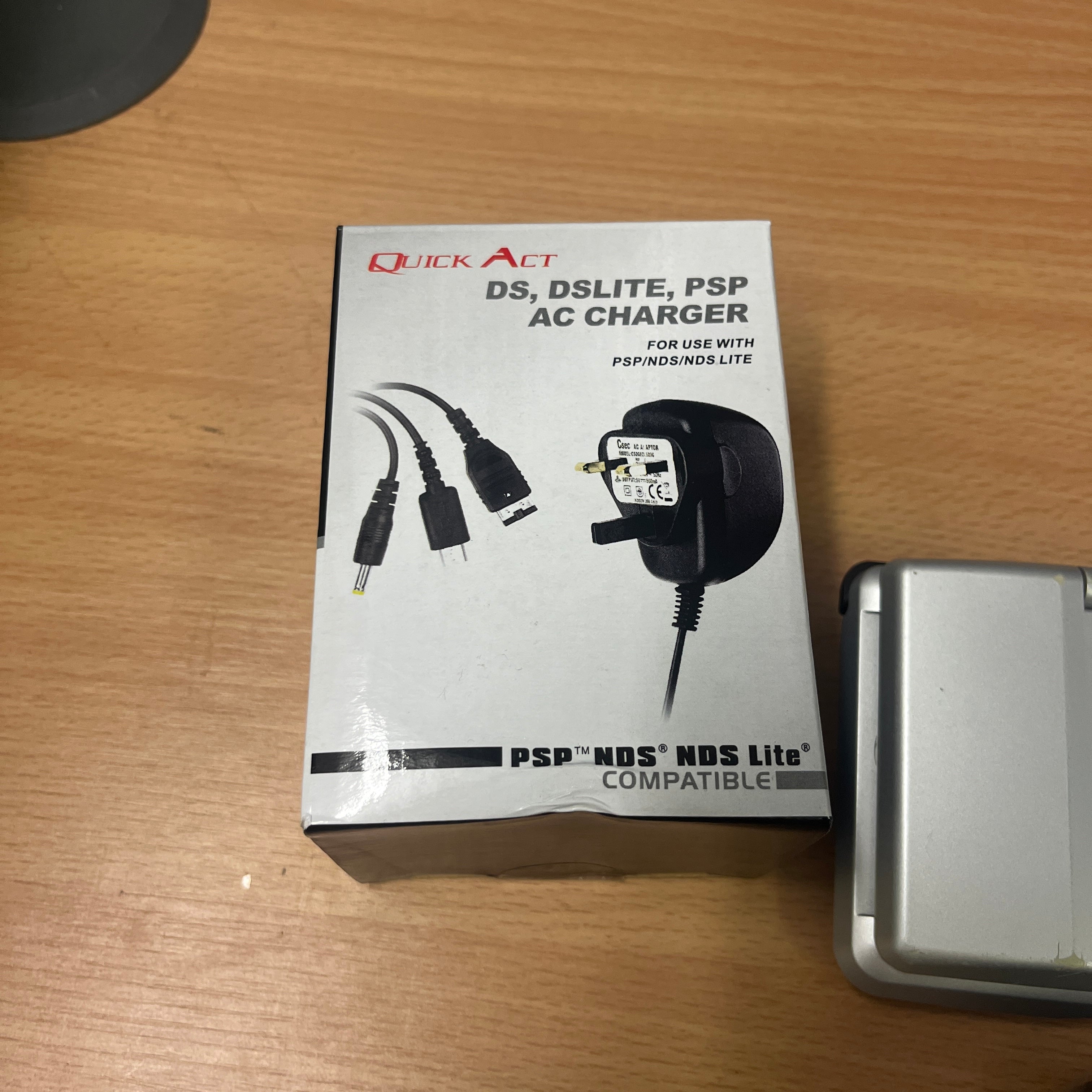 Multi Charger for Sony PSP, Nintendo DS, DS Lite, GBA SP handheld Consoles Multi Charger for Sony PSP, Nintendo DS, DS Lite, GBA SP handheld Consoles